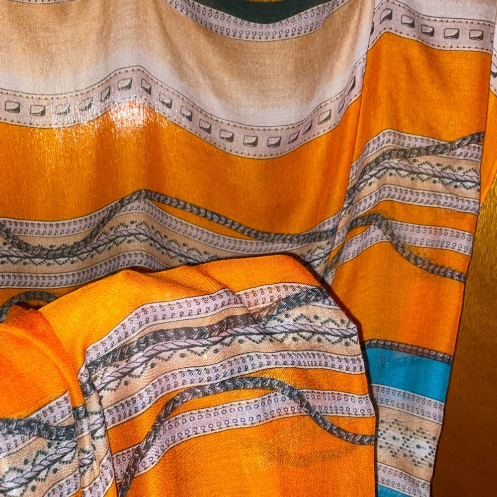 Elegant Orange and Blue Patterned Scarf